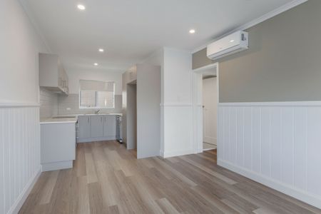 Fully Renovated Coastal Comfort - Stylish Beachside 2 Bedroom Unit with Ocean Views - Photo 3