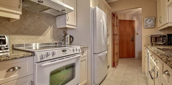 CONDO DE LUXE 4 1/2 - DERNIER ETAGE - LONGUEUIL - Photo 2