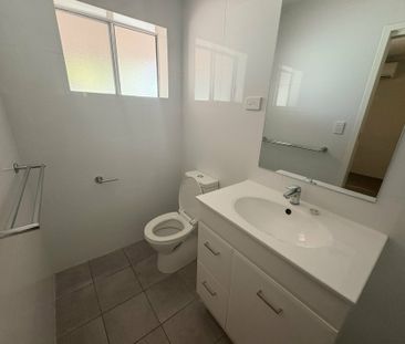 SPACIOUS FOUR BEDROOM, TWO BATHROOM HOUSE WITH 5X CARPORT - Photo 3