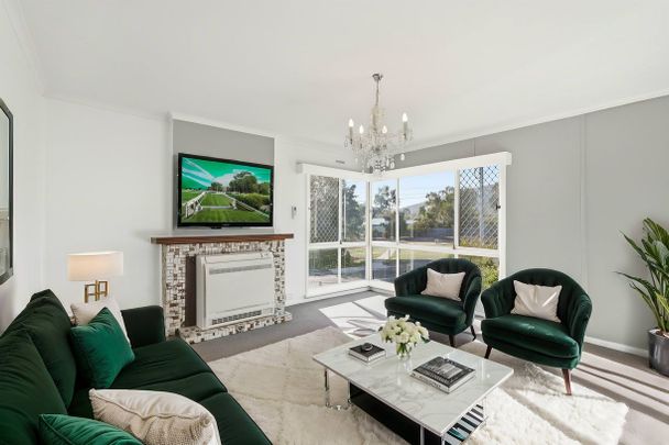 Immaculate 3-Bedroom Home in Prime Location - Photo 1