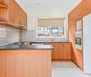 Spacious Three-Bedroom Unit with Double Garage and Outdoor Entertai... - Photo 3