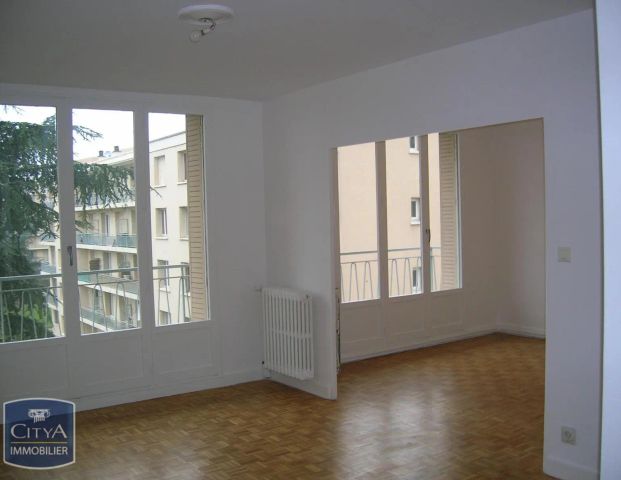 Appartement à louer 4 pièces 65.65m² - Photo 1