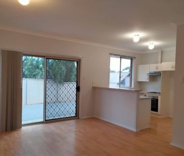 Stylish Family Living in a Convenient Location - Photo 1