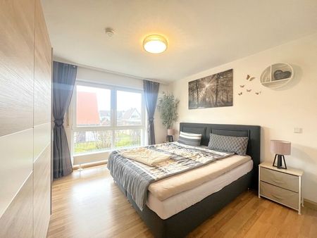 Moderne 3-Zimmer-Garten-Wohnung mit EBK und Tiefgaragenstellplatz - Foto 4