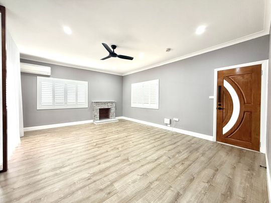 Fully Renovated Three-Bedroom Home with Carport Parking - Photo 1