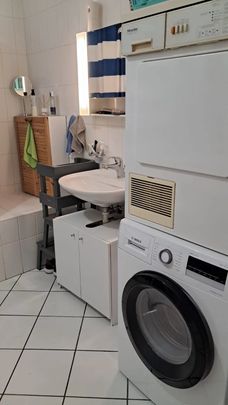 Appartement de 2,5 pièces au rez-de-chaussée - Photo 1