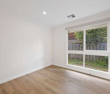 Sleek and Spacious Renovated Family Home - Photo 6