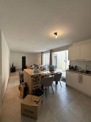 Gelijkvloers appartement midden in het centrum - Photo 4