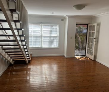 Spacious 2-Bedroom Unit in Prime Location with Built-in wardobe - Photo 6