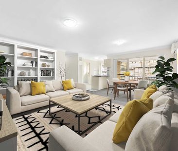 FRESHLY PAINTED 2 BEDROOM UNIT WITH SPLIT SYSTEM AND GAS COOK TOP! - Photo 1