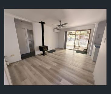 Freshly Updated Family Home with Rare Side Access in Prime Greenfie... - Photo 2