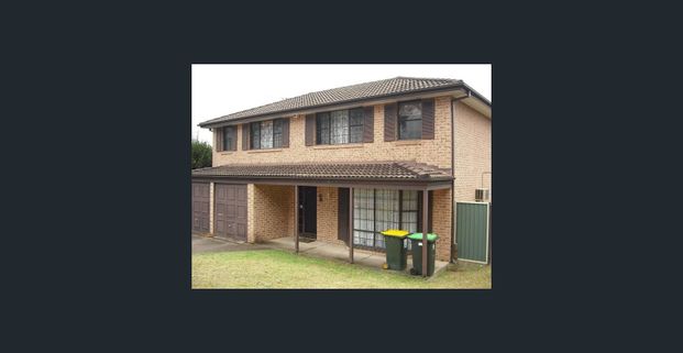 Spacious 4-Bedroom Family Home! - Photo 1