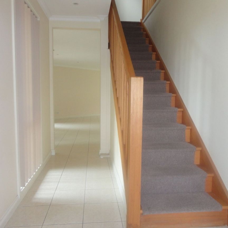 Spacious Townhouse in Prime Location - McKinnon School Zone - Photo 1