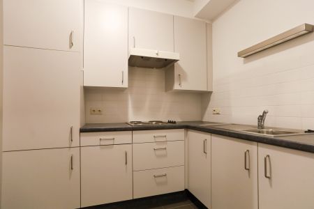 Serviceflat op het glvl met 2 slpks en terras - Photo 5