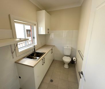 Fully & Extensively Renovated 3 Bedroom Brick Home - Like New inside - Photo 5