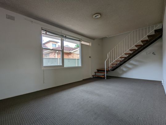Peaceful Ground Floor Living with Lifestyle Convenience - Photo 1