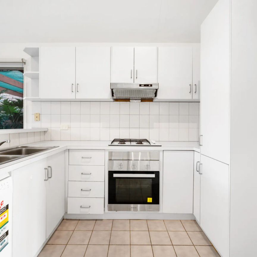 Large two bedroom, two living area townhouse offers rare opportunity - Photo 1
