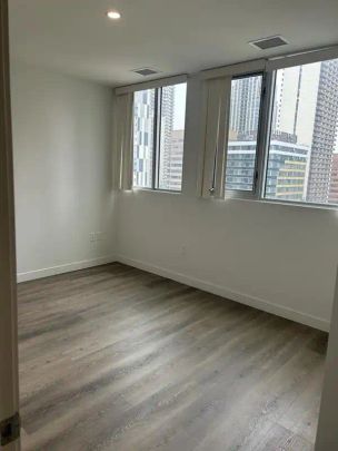 The District Apartments — Premium 1 Bed 1 Bath - Photo 1