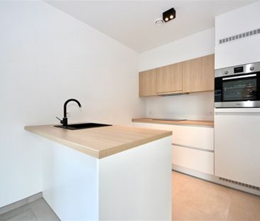Appartement met 2 slaapkamers, tuin en staanplaats. - Foto 1