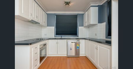 Three-Bedroom Apartment - Photo 5