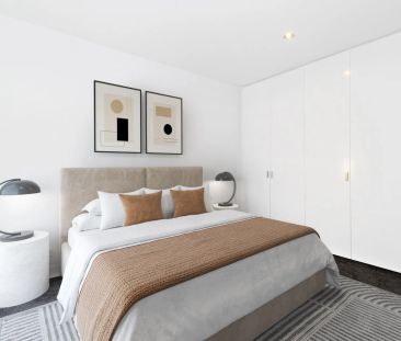 Modern Two-Bedroom Townhouse with Balcony and Secure Garage - Photo 1