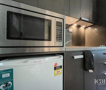 Simple Practical Living in a CBD Studio Apartment - Photo 5