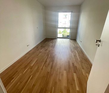 KfW 40-Neubau-Wohnung mit EBK, Balkon, Echtholzparkett, Fahrstuhl, Tiefgarage - Foto 6