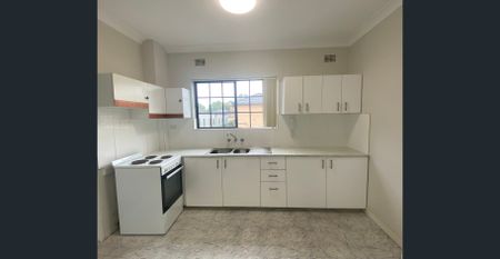 Light Filled Apartment with Lock Up Garage - Photo 4