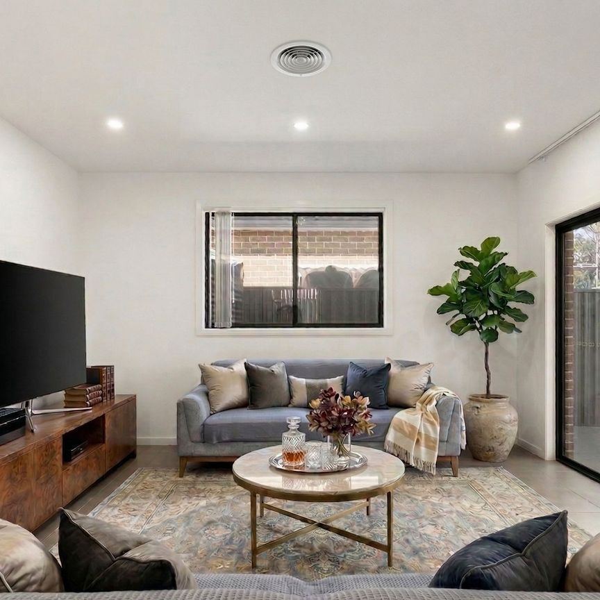 Charming Four Bedroom Family Home with Modern Comforts In A Prime Location - Photo 1