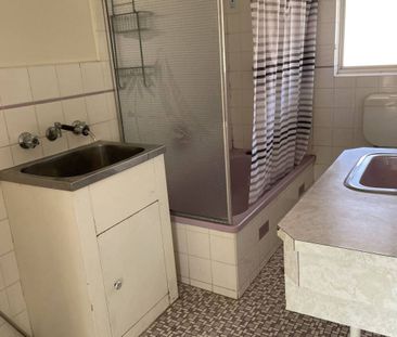 Spacious Upstairs Unit in Prime Location - Photo 6