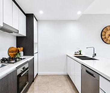 Stylish Two-Bedroom Apartment In A Highly Sought After Complex - Photo 2