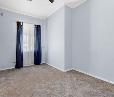 Charming 3-Bedroom Home with Spacious Yard in Elizabeth Downs - Photo 5