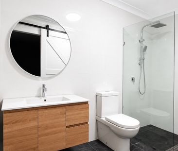 Fully Renovated Three-Bedroom Home in Peaceful Surfers Palms East - Photo 1