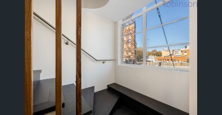 Modern split-level apartment with luxe finishes in a prime location. - Photo 2