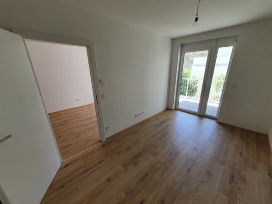 Geförderte Neubauwohnung mit Balkon im 1. Stock - Photo 1