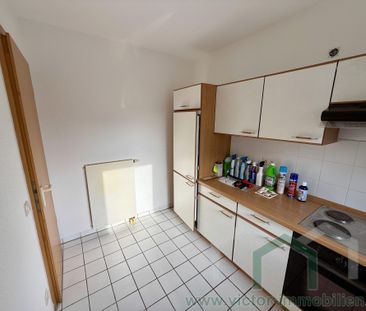** 2-Zimmer-Wohnung mit Balkon, Einbauküche und TG-Stellplatz im Ze... - Photo 3