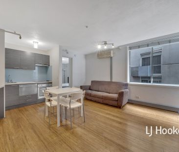 Highlight Your Living Experience in this Gorgeous CBD Furnished APT! - Photo 1