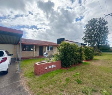 DEPOSIT TAKEN Low-Set, Low-Maintenance Family Home - Photo 2