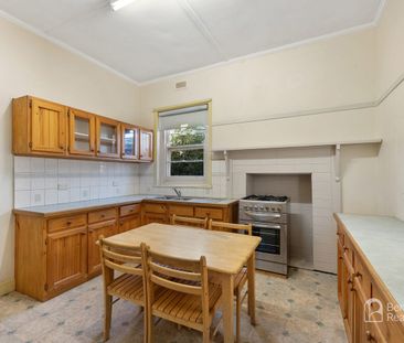COMFORTABLE TWO-BEDROOM HOME WITH VERSATILE RUMPUS ROOM - Photo 4