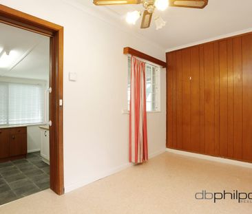 NEAT AND TIDY FOUR BEDROOM HOME IN POORAKA - Photo 1