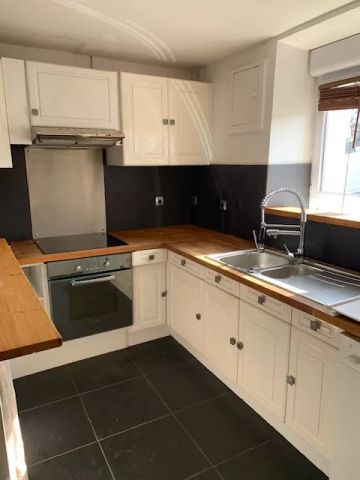 Appartement 2 pièces en duplex avec jardin - Photo 3