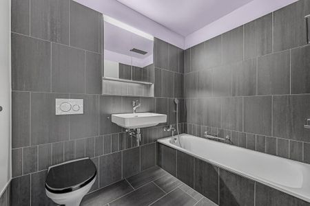 Modern apartment with exclusive amenities and an urban touch - Photo 2