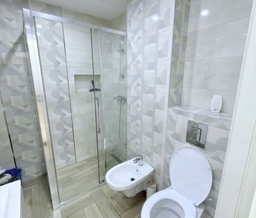 Apartament ultracentral mobilat si utilat cu parcare proprietate - Fotografie 5