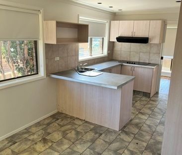 Family Home in Convenient Killarney Vale Location - Photo 4