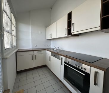 Moderne Dachgeschoßwohnung mit Terrasse und Loggia! - Photo 1