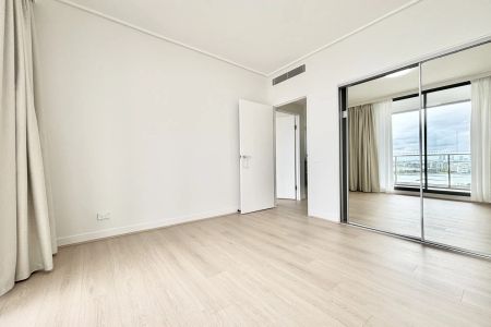 Luxury Apartment with Spectacular Water Views | Top Floor of Complex - Photo 4