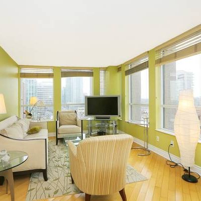 Cheerful 2 Bedroom with 2 Bathrooms plus Balcony and Hardwood Floors - Photo 1