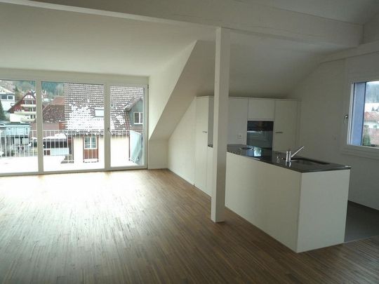 Topmoderne 3.5-Zimmer-Dachwohnung in Niederscherli - Foto 1