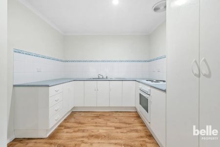 Neat 3-Bedroom Home in Wanted Locale - Photo 2