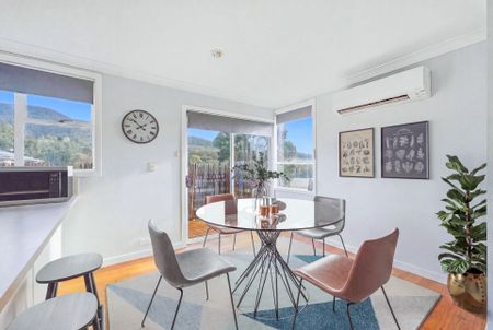 Comfortable Three-Bedroom Home in a Convenient Location - Photo 4